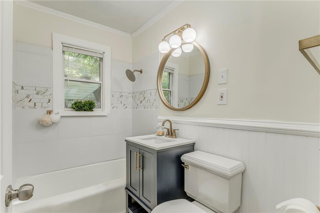 2005 Highland Circle Rome, GA 30161 - Photo 27 of 36 a bathroom with a sink and a mirror