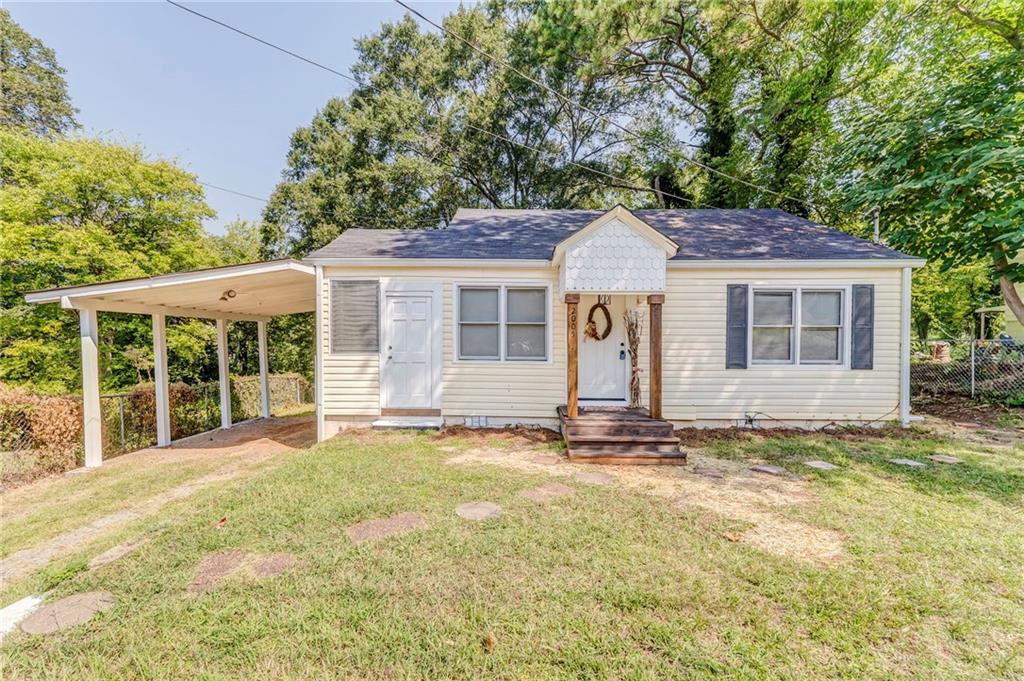 2005 Highland Circle Rome, GA 30161 - Photo 32 of 36 front view of a house with a yard