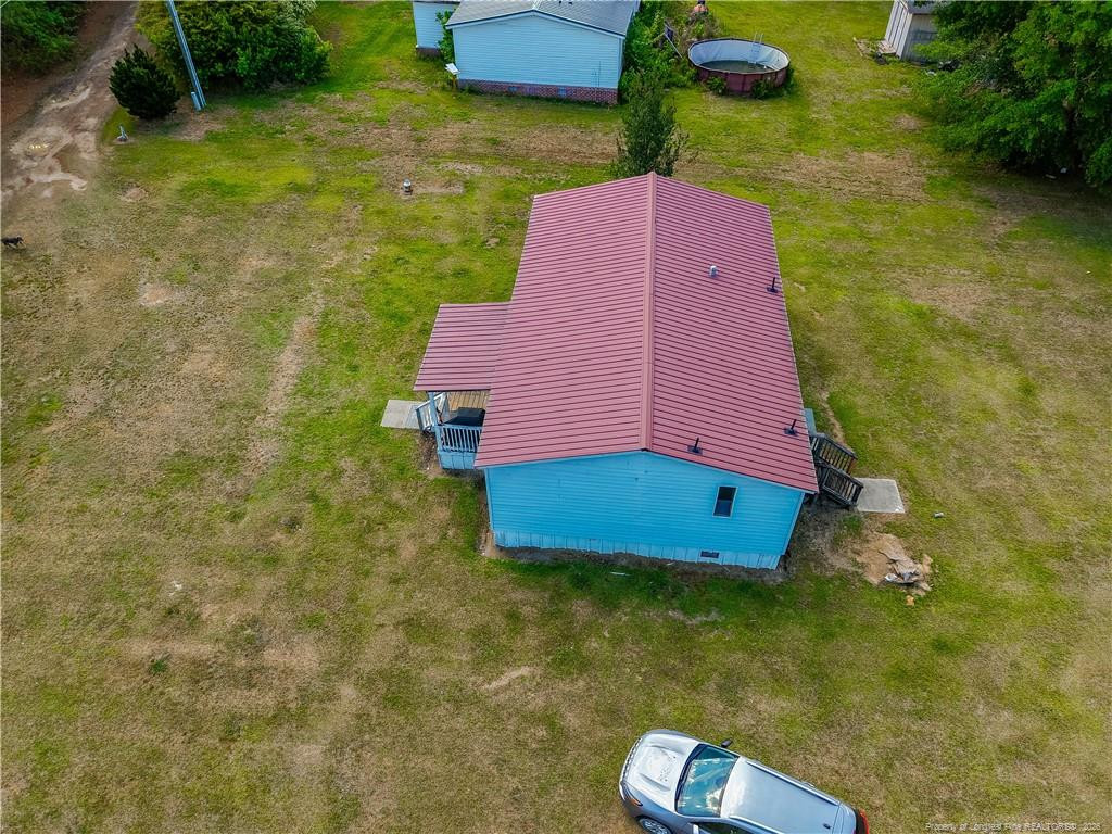 231 Knight Lane Autryville, NC 28318 - Photo 9 of 27 a aerial view of a house with a yard