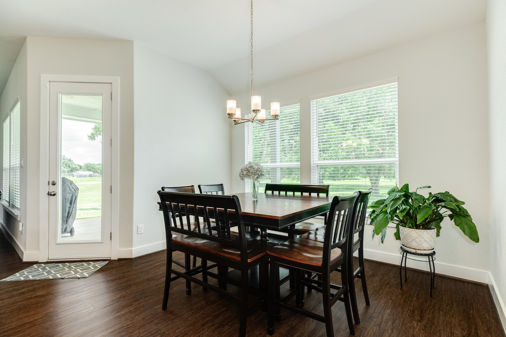 527 Lakeland Circle Rosharon, TX 77583 - Photo 5 of 42 a view of a dining room with furniture window and wooden floor