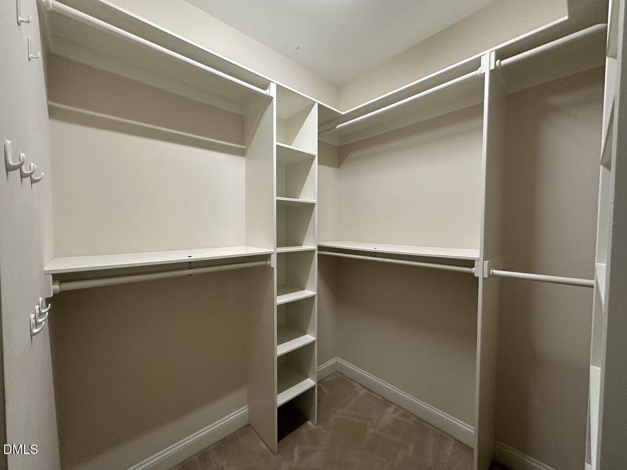 1056 Indigo Ridge Place Cary, NC 27519 - Photo 20 of 33 a view of an empty walk in closet