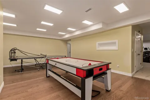 a bedroom with a bed and a table