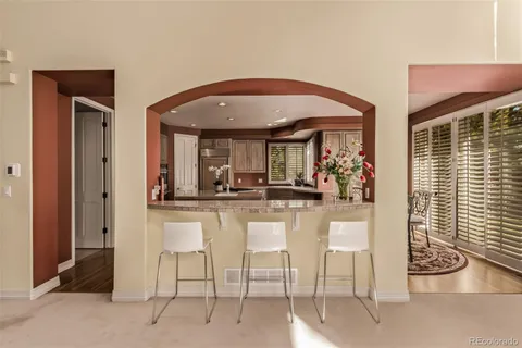 a view of living room with furniture and a window