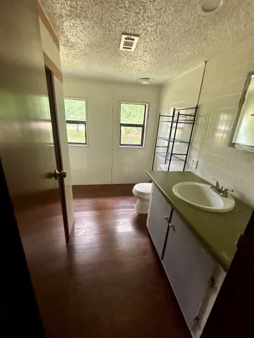a bathroom with sink and mirror