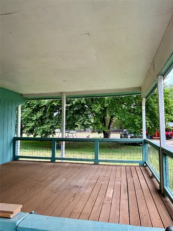 a view of outdoor space with deck and wooden floor