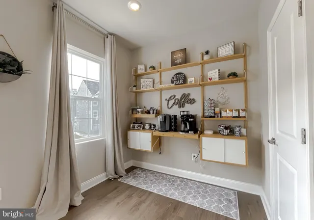 a view of living room with furniture and window