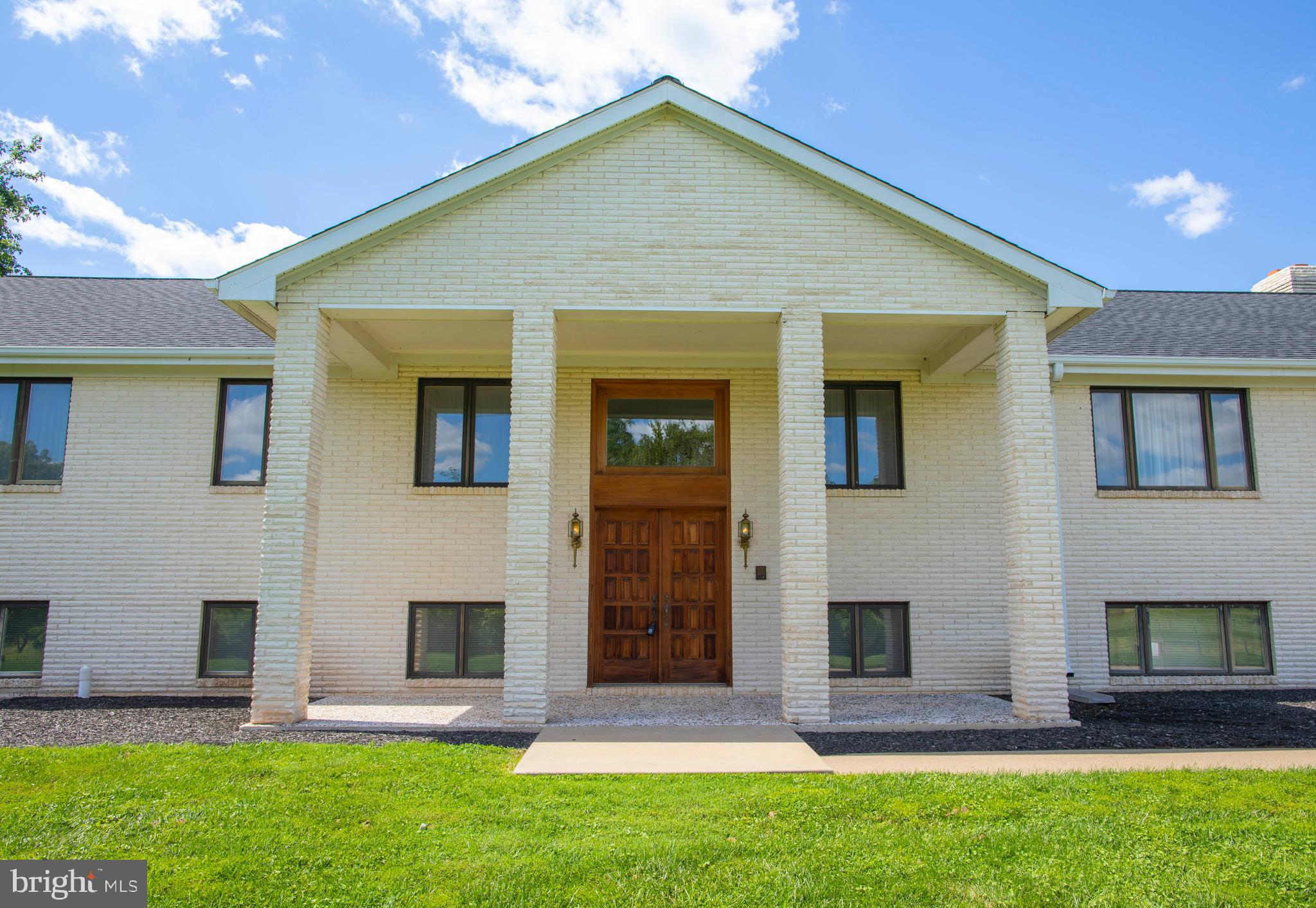 4600 Catharpin Road Gainesville, VA 20155 - Photo 1 of 44 Columns and double door entry