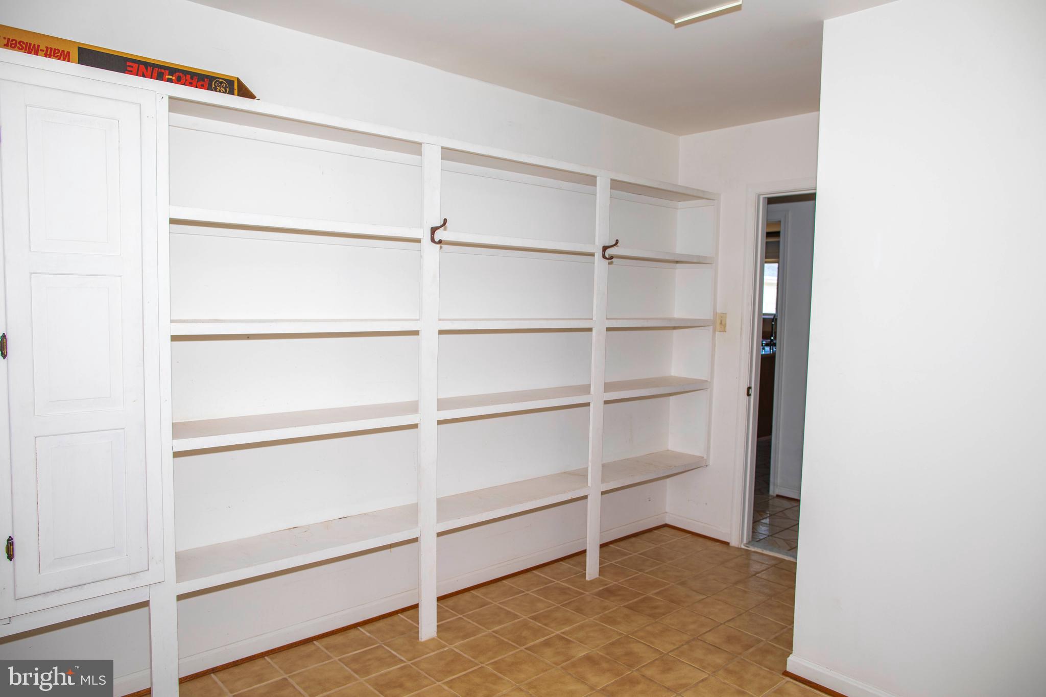4600 Catharpin Road Gainesville, VA 20155 - Photo 20 of 44 Built-in shelves in laundry room