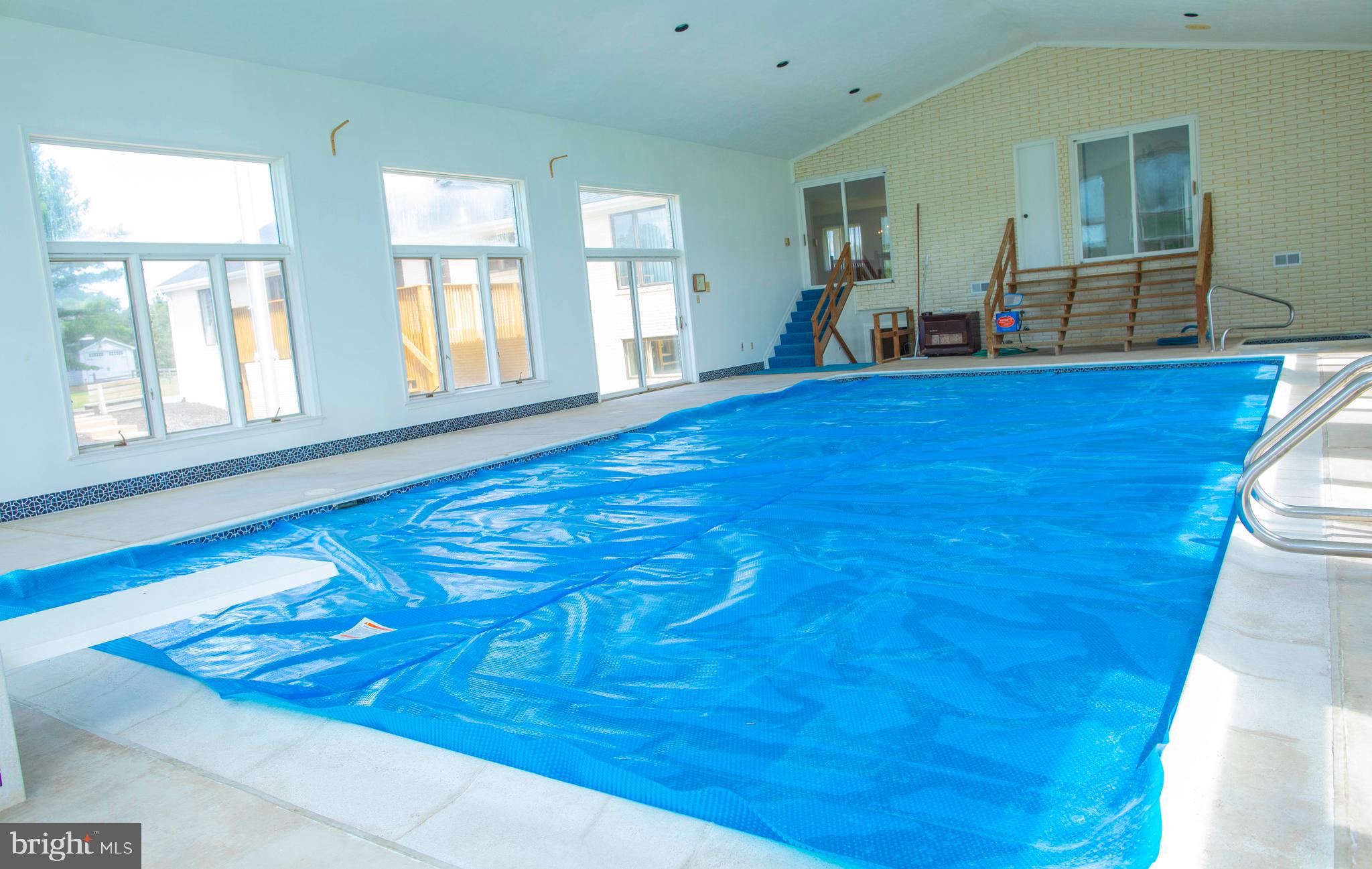 4600 Catharpin Road Gainesville, VA 20155 - Photo 33 of 44 Indoor pool and hot tub with attached 1/2 bath