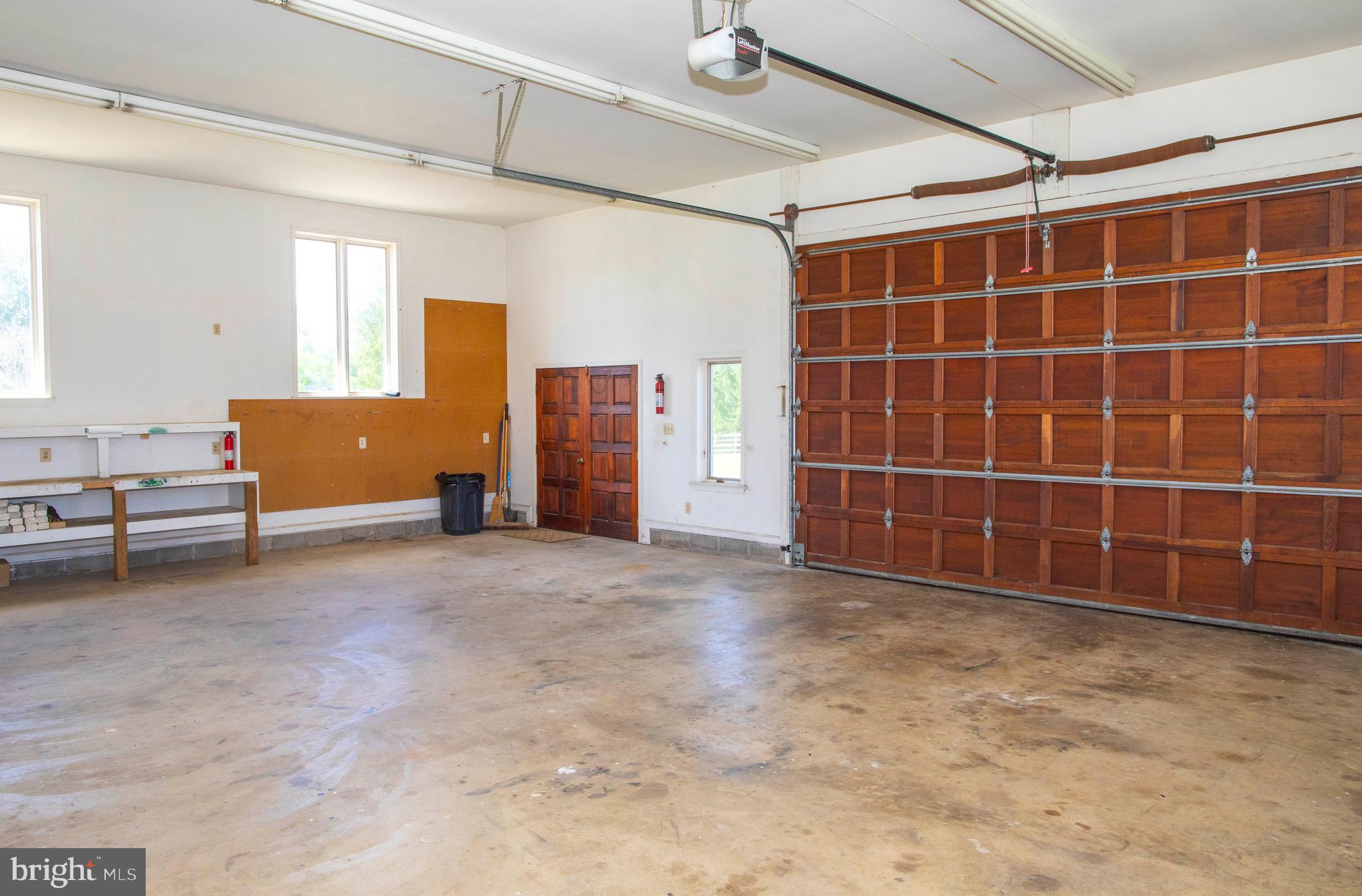 4600 Catharpin Road Gainesville, VA 20155 - Photo 35 of 44 Expansive 2 car garage with extra storage space