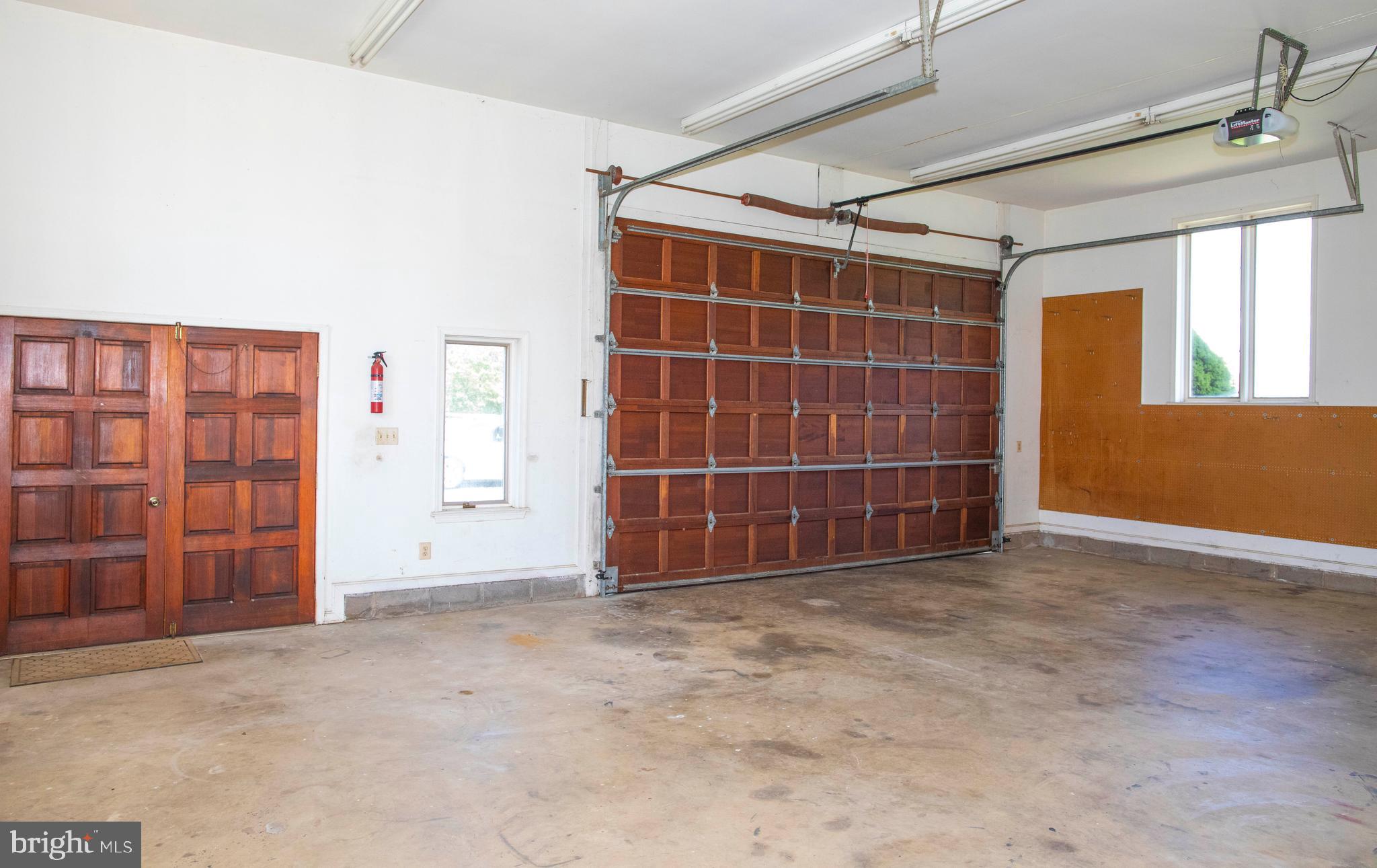 4600 Catharpin Road Gainesville, VA 20155 - Photo 36 of 44 Expansive 2 car garage with extra storage space