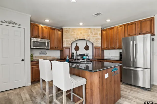 a view of a kitchen area with furniture and window