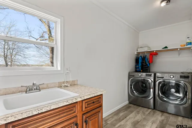 a bathroom with a toilet a sink and a mirror