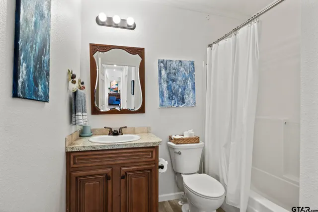 a bedroom with furniture and baby crib