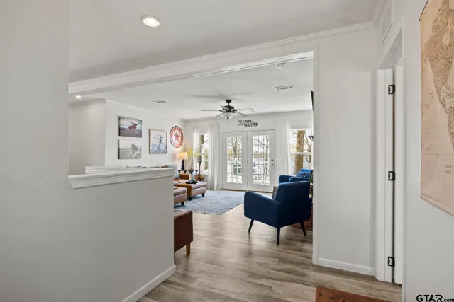 a bedroom with furniture and a window