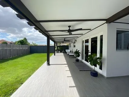 a view of a lake with a yard