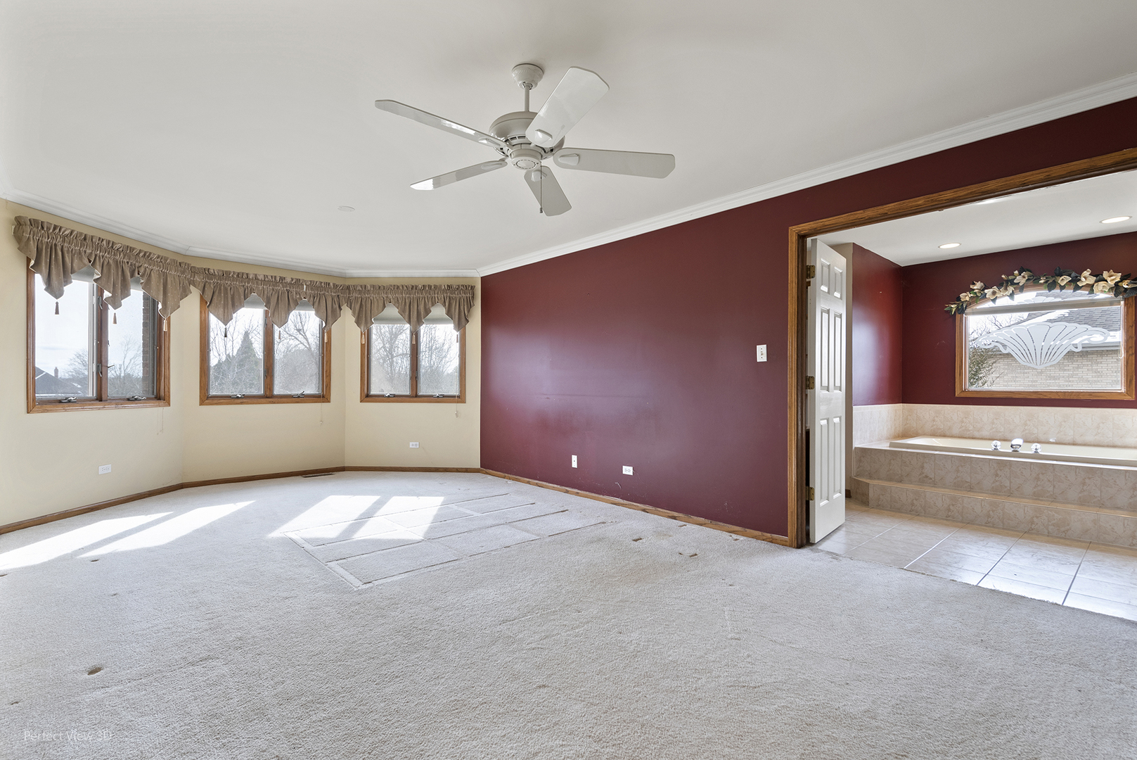 13172 Briar Patch Lane Lemont, IL 60439 - Photo 11 of 26 a view of an empty room with chandelier fan and fire place