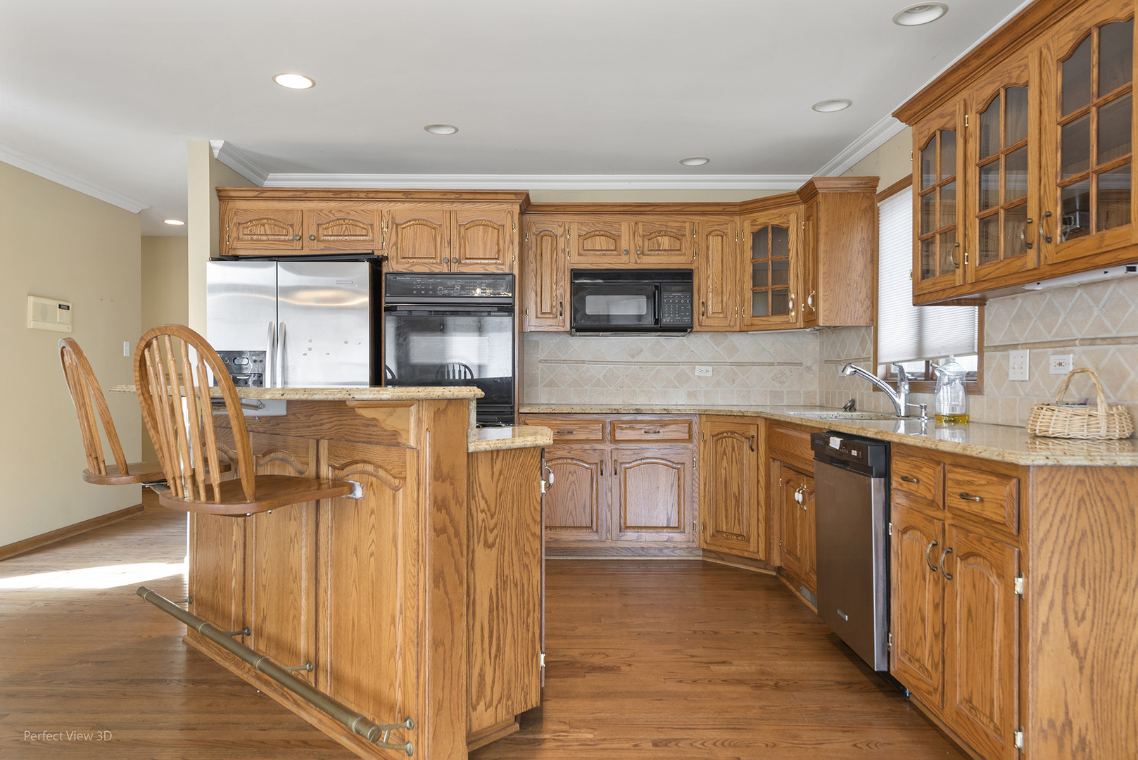 13172 Briar Patch Lane Lemont, IL 60439 - Photo 8 of 26 a kitchen with stainless steel appliances granite countertop a refrigerator and a sink