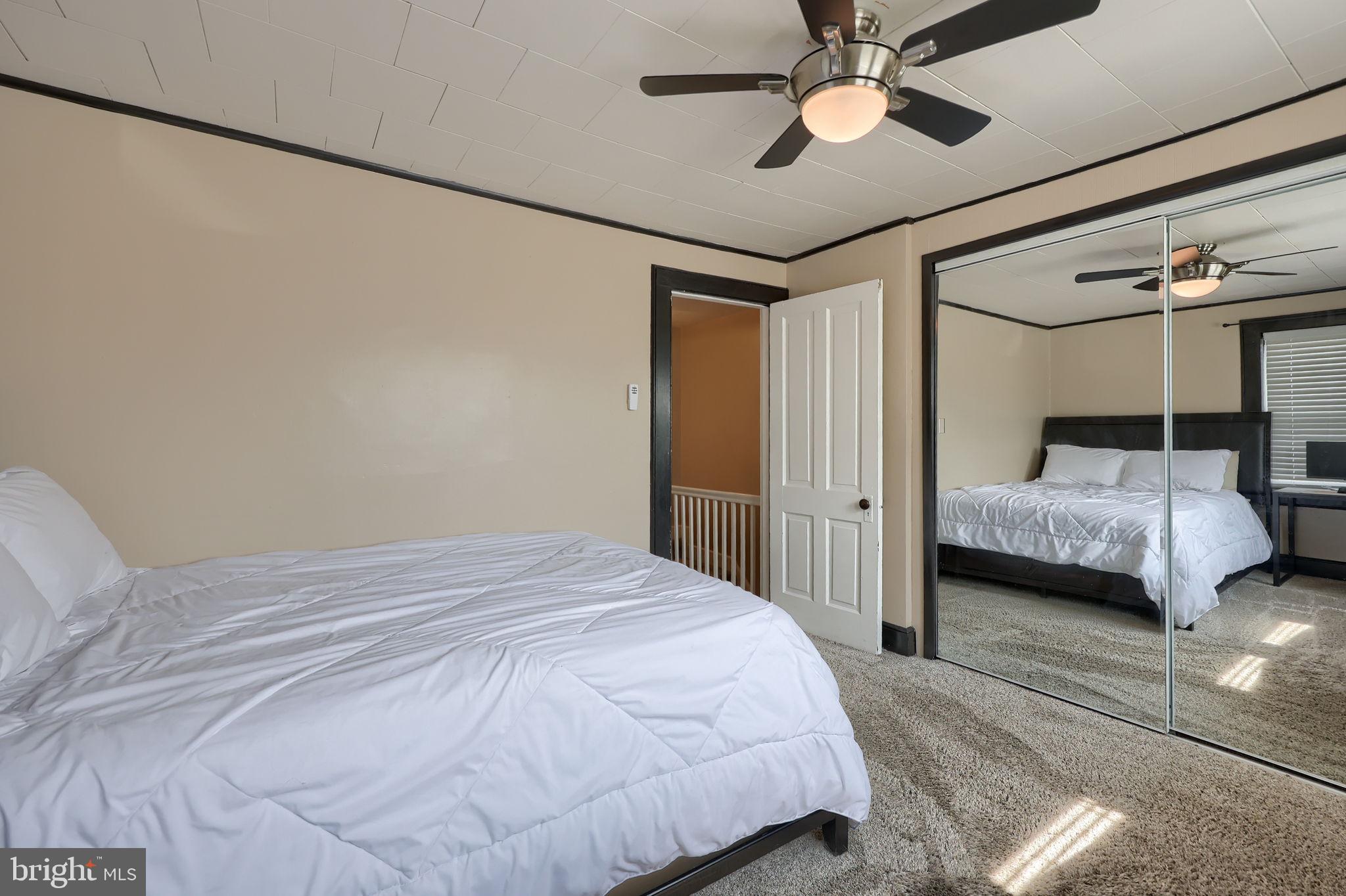 849 Delta Avenue Reading, PA 19605 - Photo 22 of 31 a bedroom with a bed and a ceiling fan