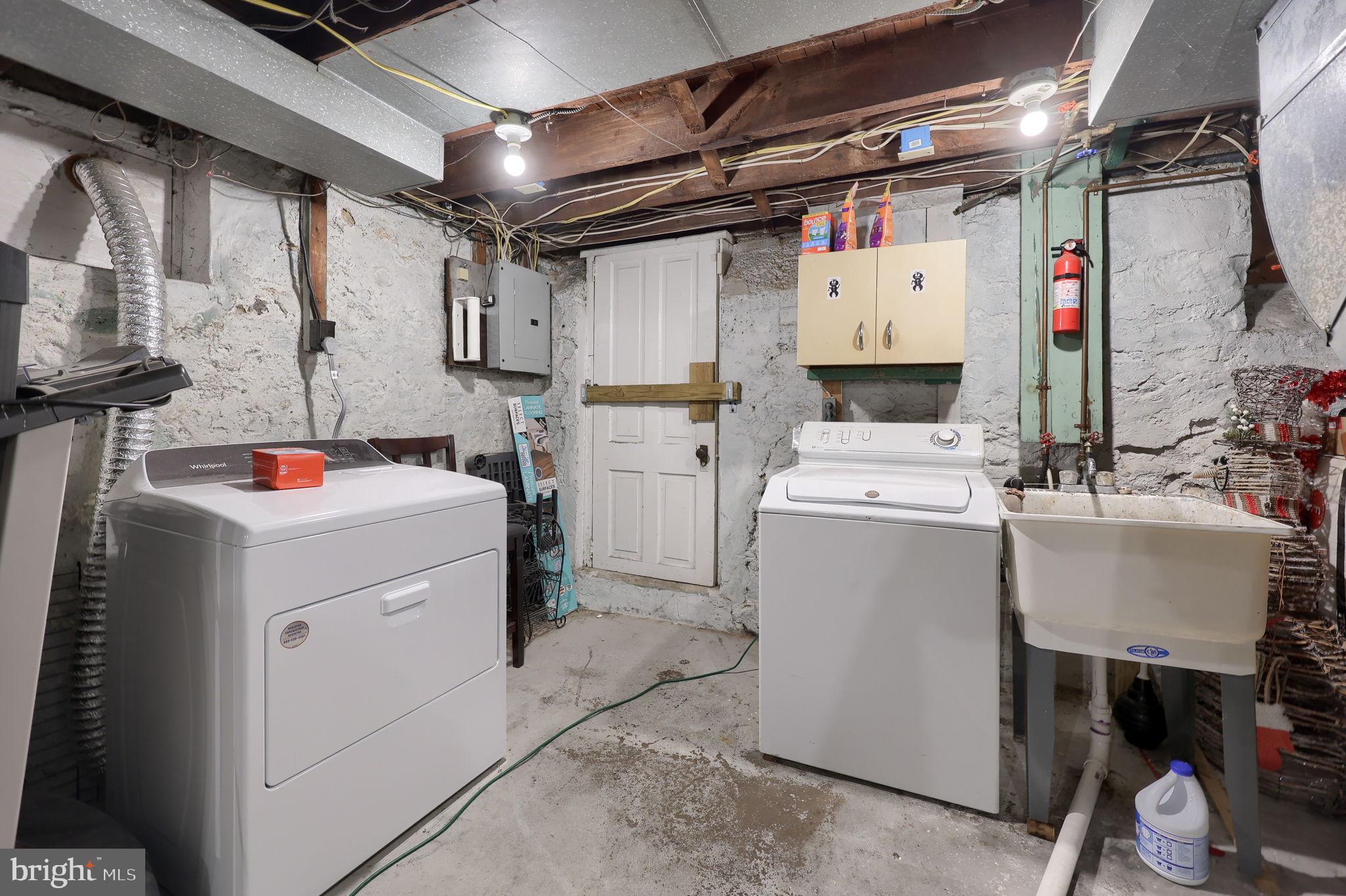849 Delta Avenue Reading, PA 19605 - Photo 24 of 31 a utility room with dryer and washer