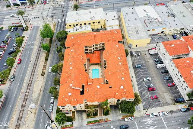 an aerial view of residential houses and outdoor space