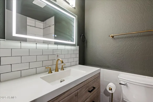 a view of buildings from the balcony