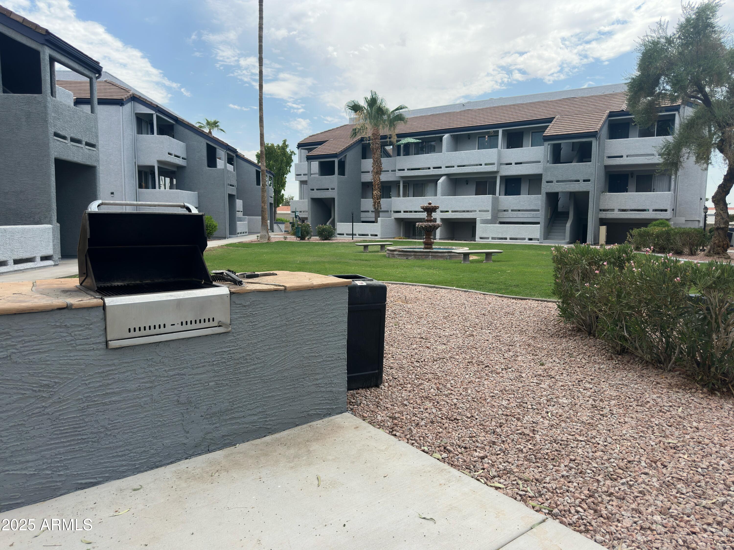 1331 West Baseline Road, Unit 219 Mesa, AZ 85202 - Photo 10 of 17 a house view with a garden space