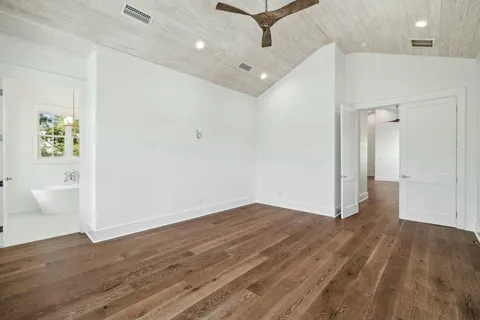 a kitchen with a stove a sink and a microwave