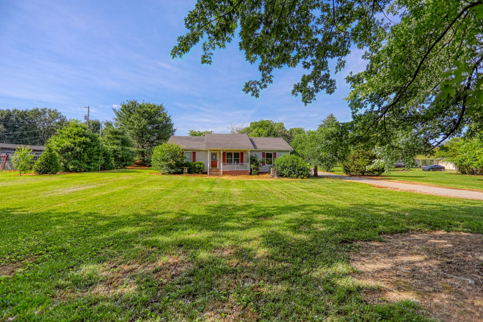 3845 Armstrong Road Springfield, TN 37172 - Photo 26 of 34 a view of house with garden space and trees