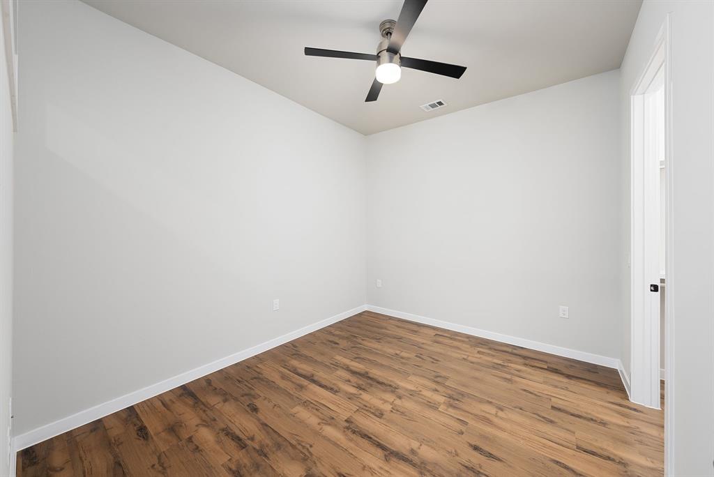 4510 Terry-O Lane, Unit 416 Austin, TX 78745 - Photo 14 of 40 a view of empty room with wooden floor