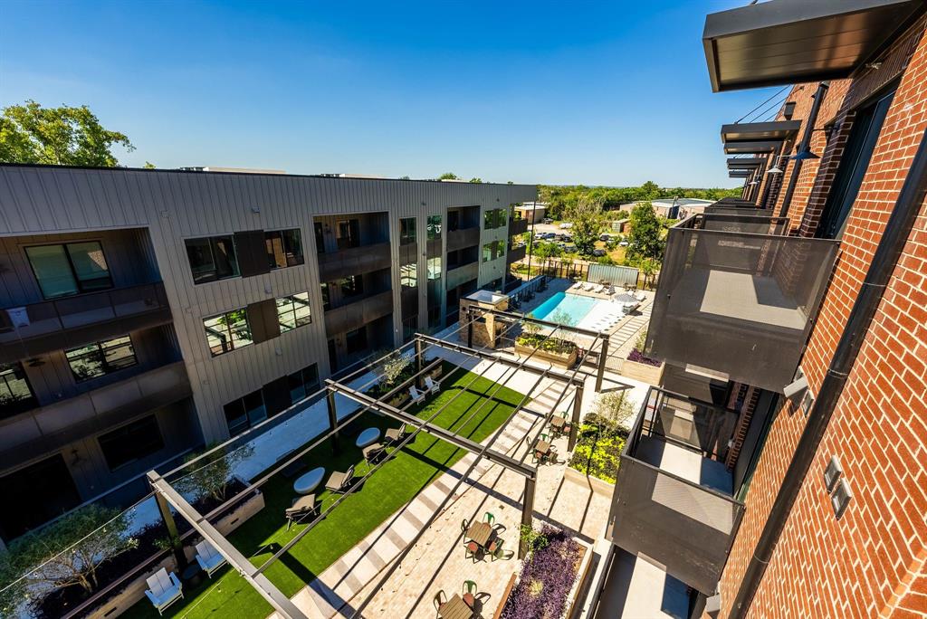 4510 Terry-O Lane, Unit 416 Austin, TX 78745 - Photo 19 of 40 a living room with furniture fireplace and flat screen tv