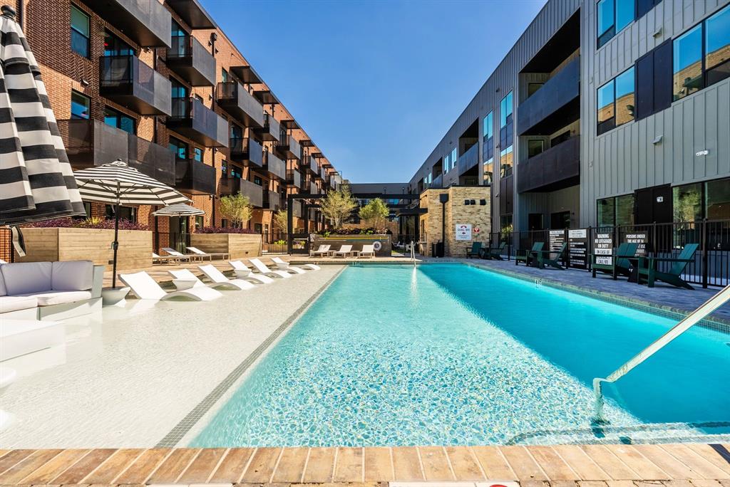 4510 Terry-O Lane, Unit 416 Austin, TX 78745 - Photo 21 of 40 a multi story building with a yard