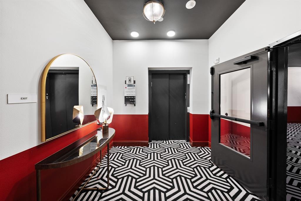 4510 Terry-O Lane, Unit 416 Austin, TX 78745 - Photo 27 of 40 a lobby with furniture and mirror