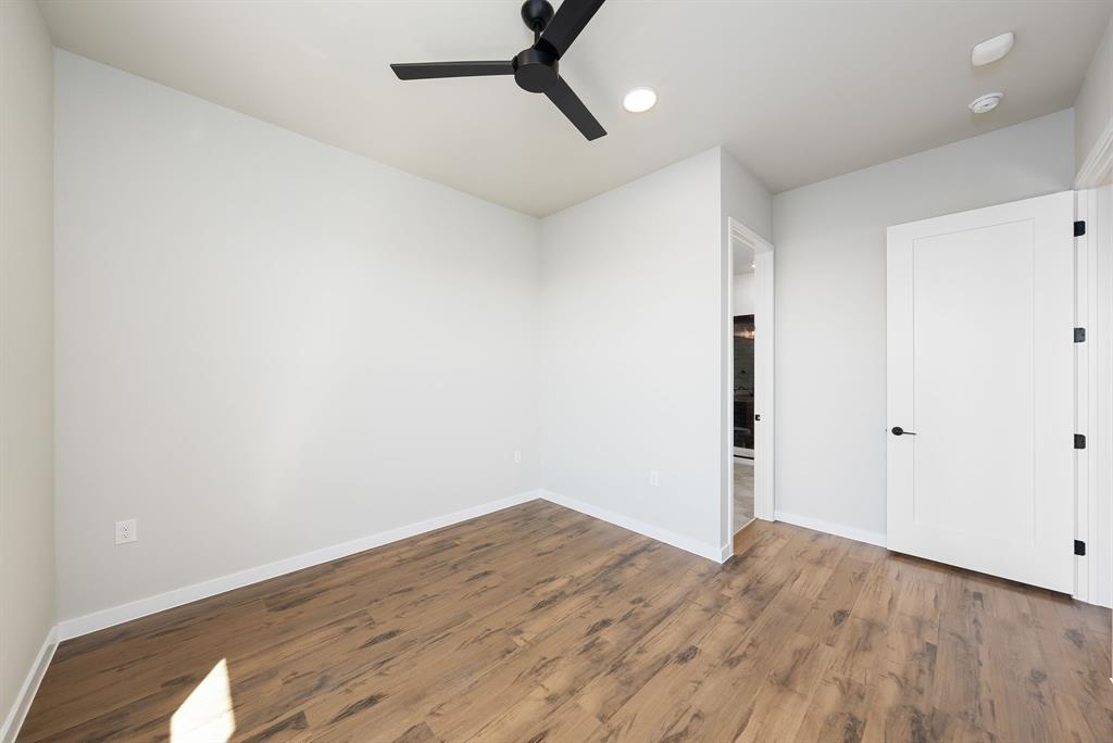 4510 Terry-O Lane, Unit 416 Austin, TX 78745 - Photo 8 of 40 a view of empty room with wooden floor