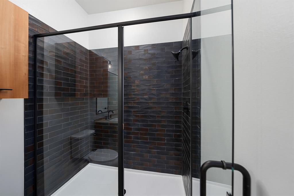 4510 Terry-O Lane, Unit 416 Austin, TX 78745 - Photo 10 of 40 a bathroom with a shower and a sink