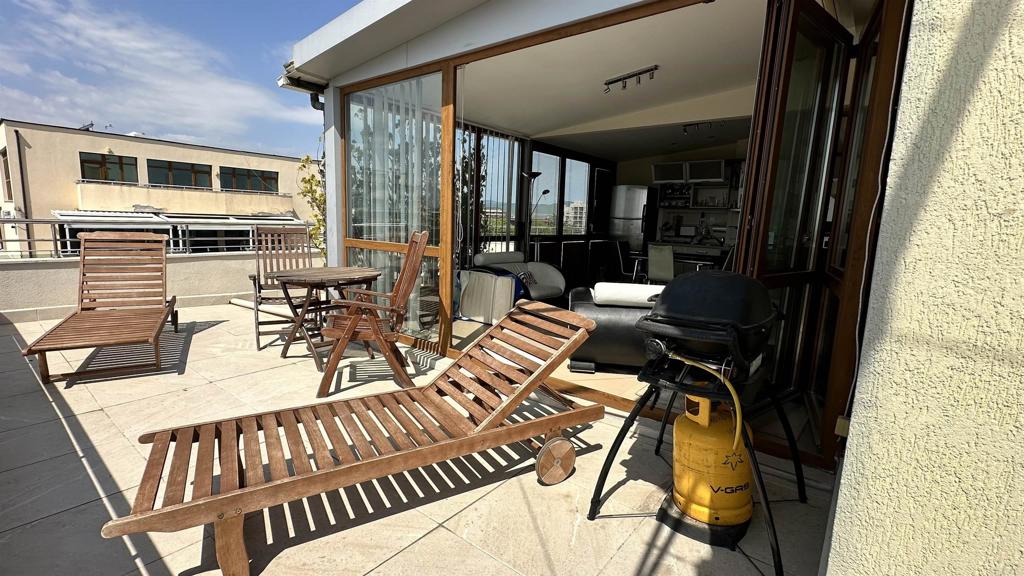 2 Flowers, Unit 51 Absecon, OS 08240 - Photo 16 of 37 a view of a dining room with furniture window and outside view
