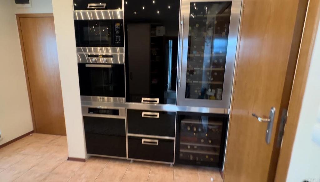 2 Flowers, Unit 51 Absecon, OS 08240 - Photo 19 of 37 a view of cabinets and a wooden door