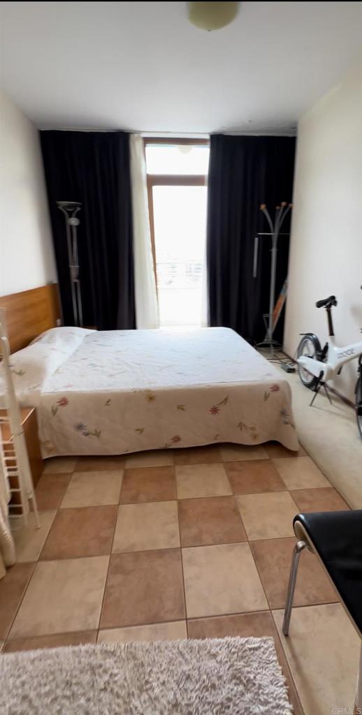 2 Flowers, Unit 51 Absecon, OS 08240 - Photo 22 of 37 a bedroom with a bed and a dresser