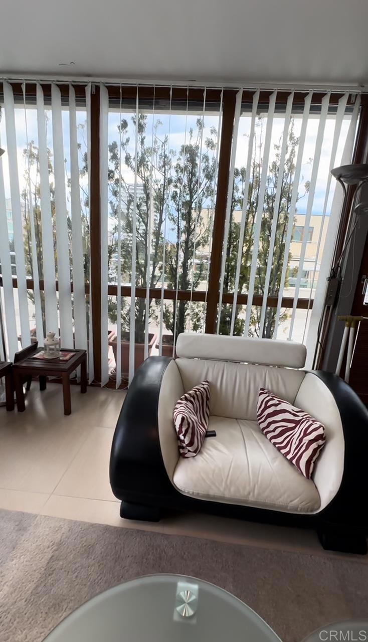 2 Flowers, Unit 51 Absecon, OS 08240 - Photo 35 of 37 a living room with furniture and a large window