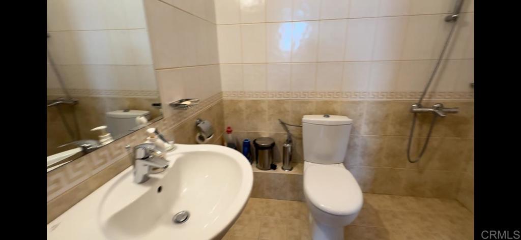 2 Flowers, Unit 51 Absecon, OS 08240 - Photo 37 of 37 a bathroom with a sink and toilet