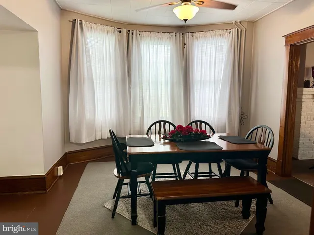 a kitchen with granite countertop a stove and cabinets