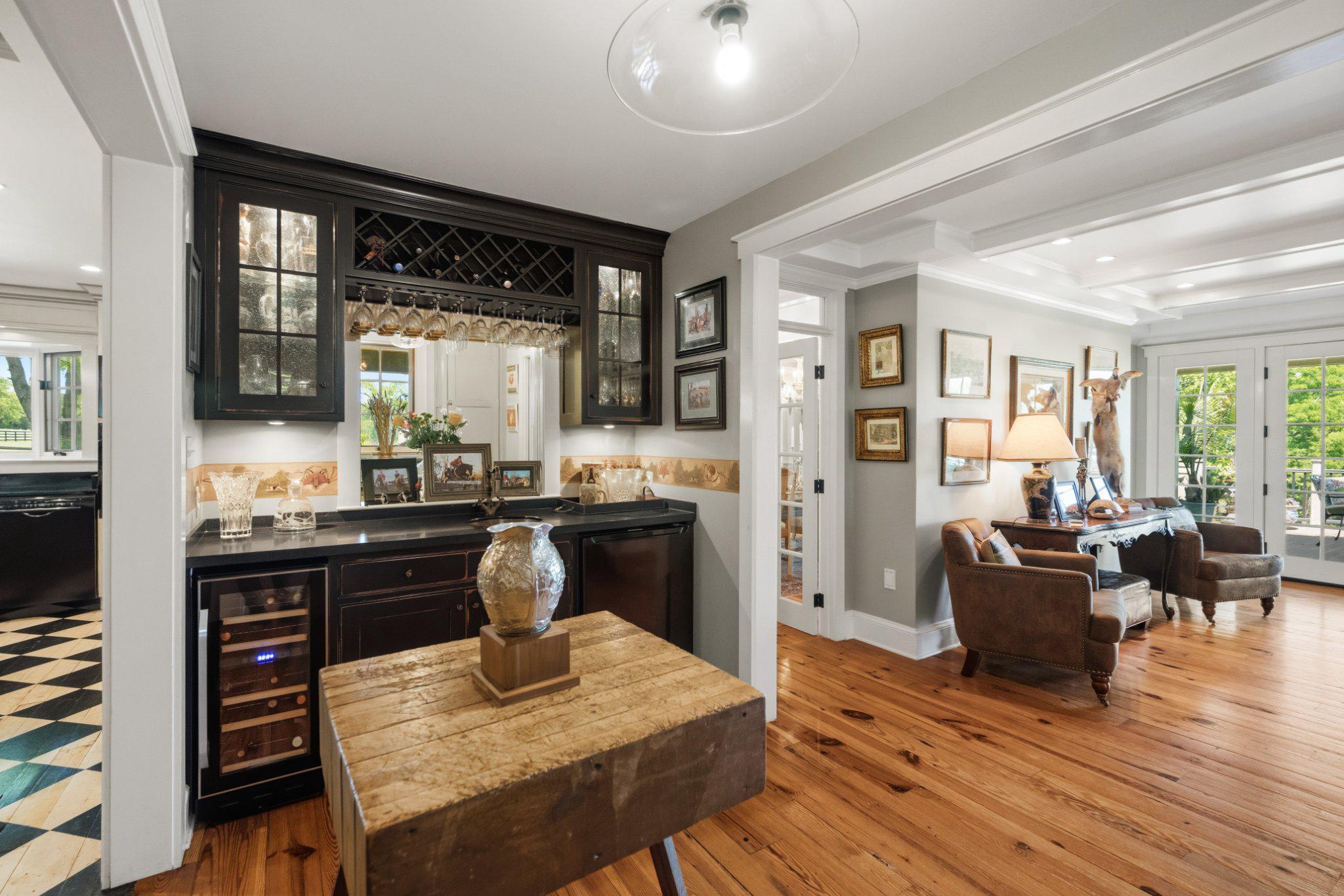 18101 Cattail Road Poolesville, MD 20837 - Photo 27 of 79 Wet bar lighted cabinetry, opens to family room