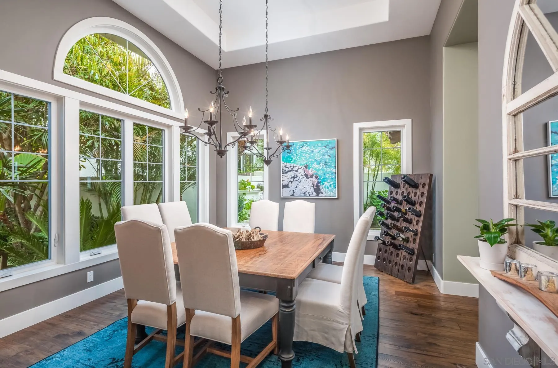 4665 Sunburst Road Carlsbad, CA 92008 - Photo 11 of 29 a view of a dining room with furniture window and wooden floor