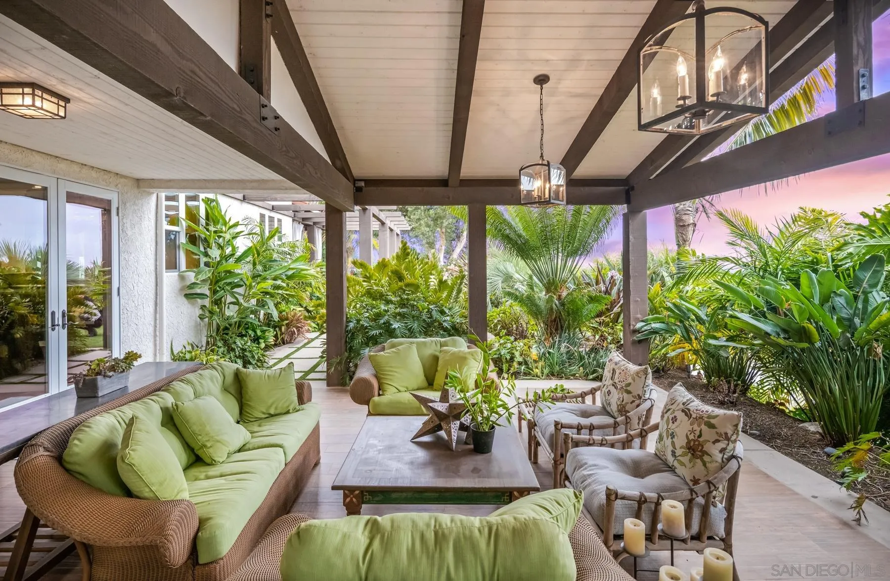 4665 Sunburst Road Carlsbad, CA 92008 - Photo 15 of 29 a living room with patio furniture and a large window