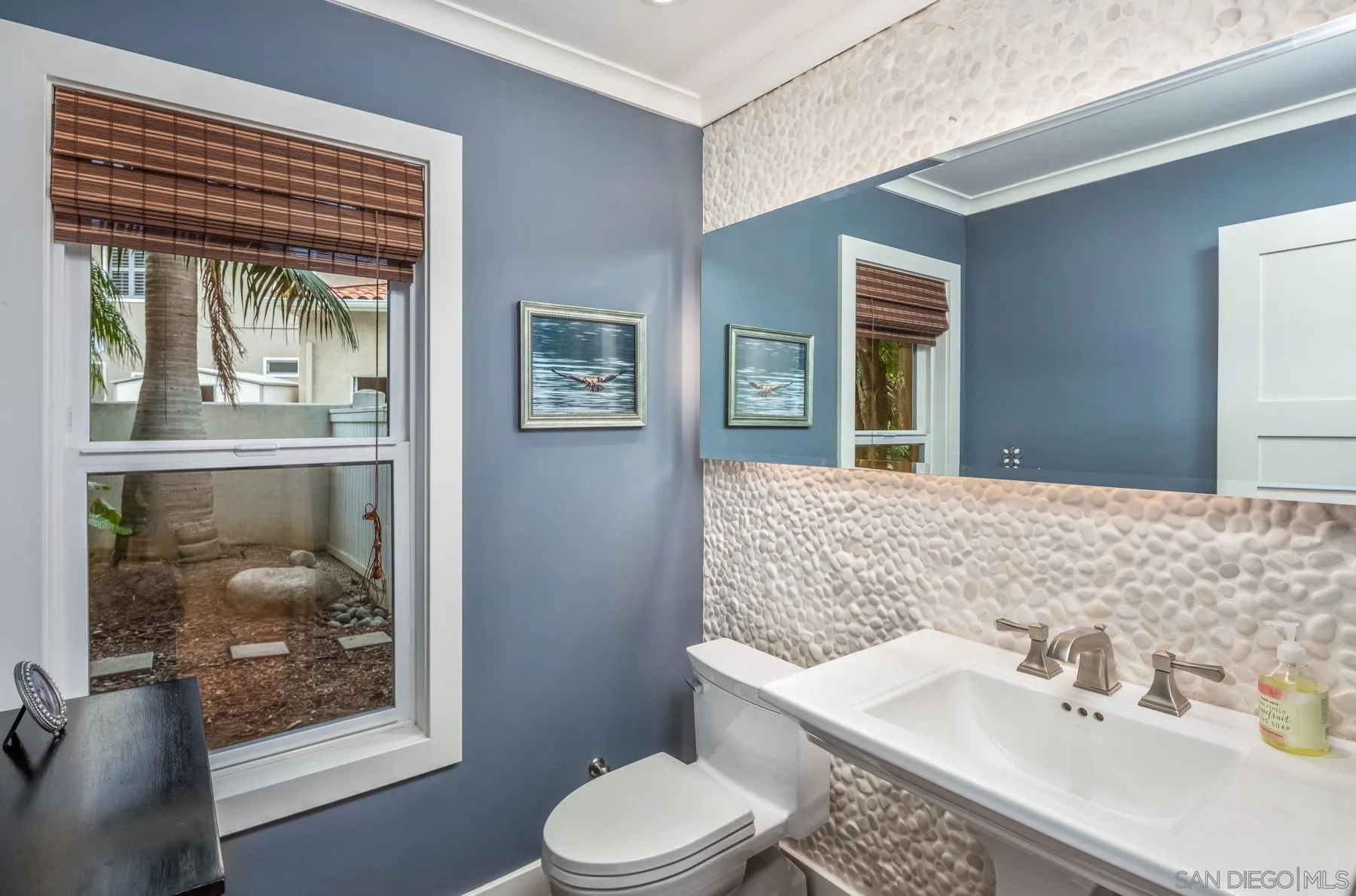 4665 Sunburst Road Carlsbad, CA 92008 - Photo 24 of 29 a bathroom with a sink a toilet and shower