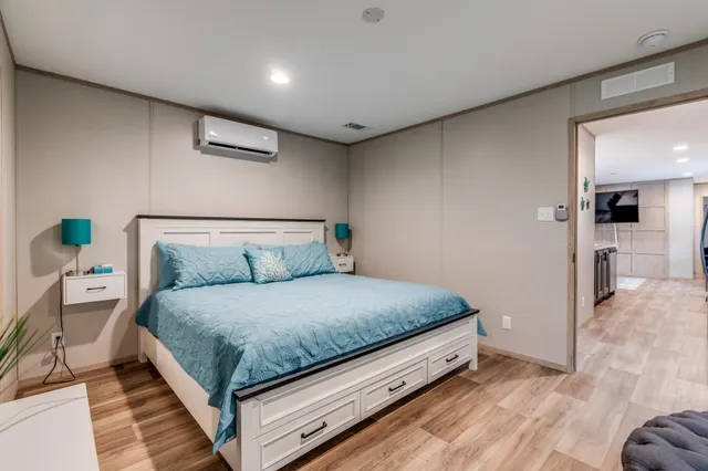 a bed room with a bed and with furniture