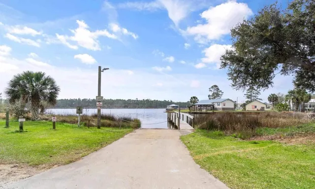 a view of a lake with a garden