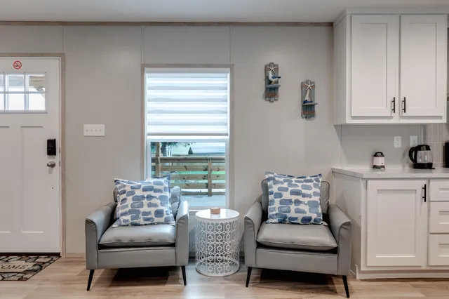 a living room with furniture and a window