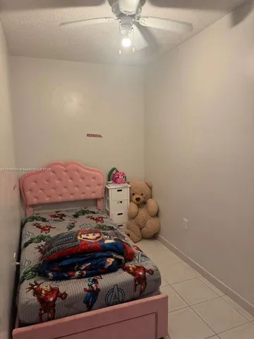 a view of a living room with entryway