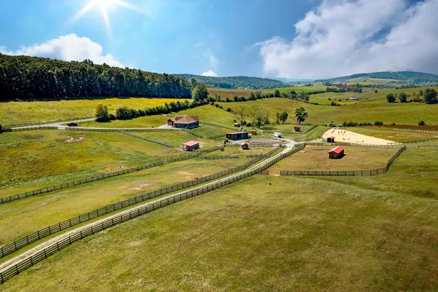 a view of an swimming pool with an outdoor seating